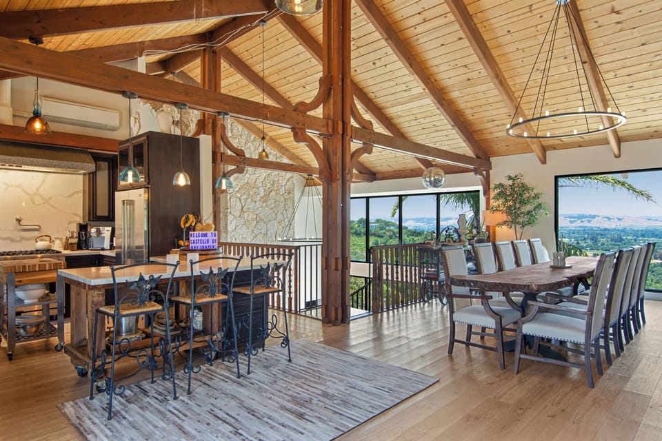 Dining room & kitchen with winery vineyard views from every room