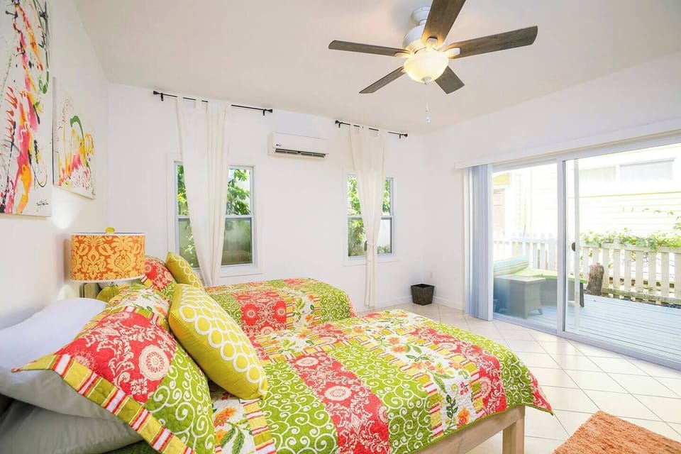 Guest bedroom with two twins & private deck.