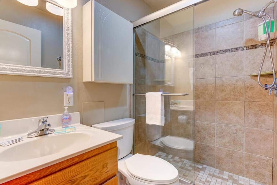 The master bathroom has a custom walk-in shower