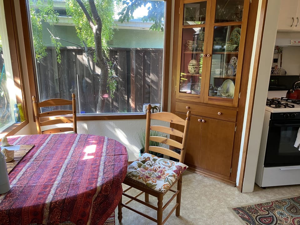 Dining area with huge garden windows