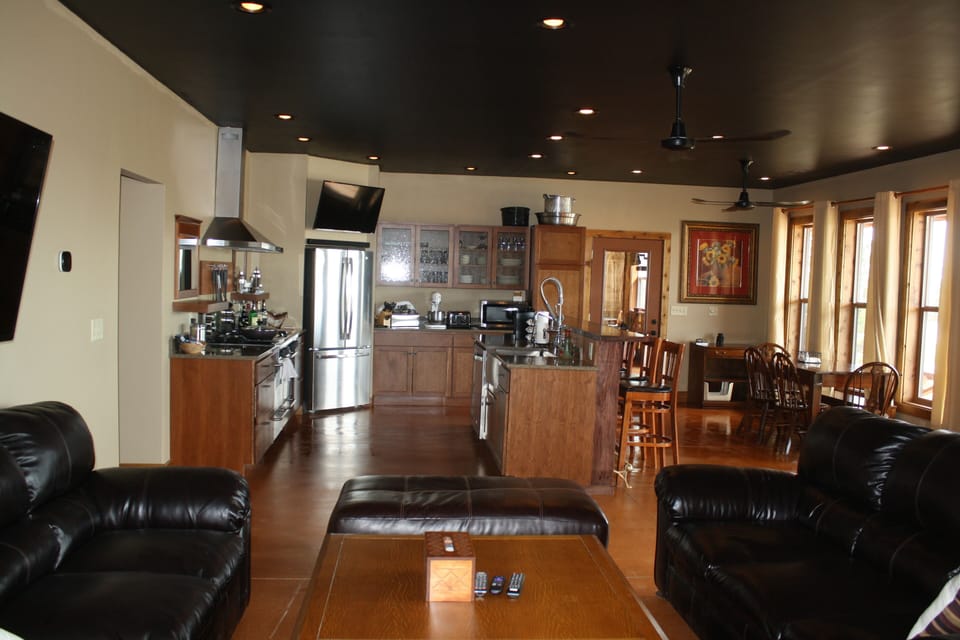 Kitchen, dining, living room and fireplace all in one great room 