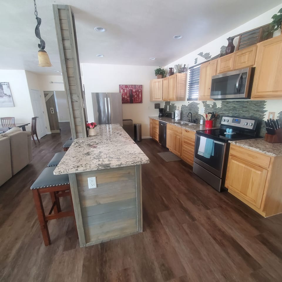 Ice maker to the right of the refrigerator makes packing the cooler easy.