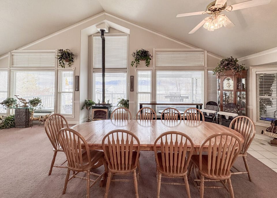 Large dining table for guest to gather for meals, games and visiting!