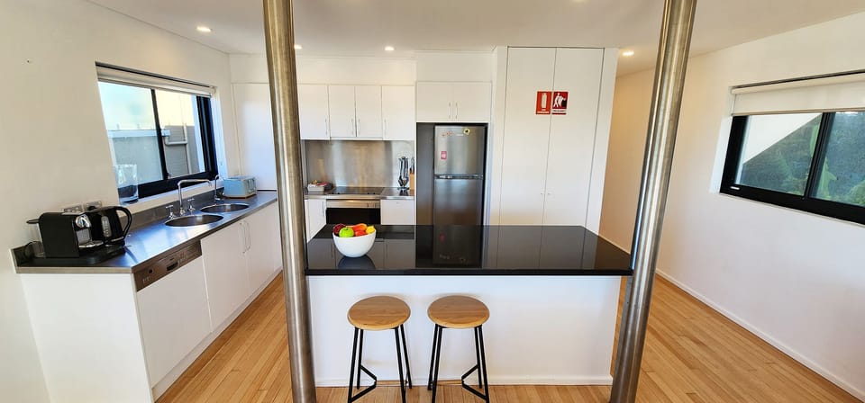 Well equipped kitchen with dishwasher, microwave, Nespresso coffee machine.