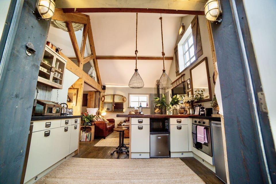 An award winning, interior designed boutique barn with surround sound, log burner and two baths!