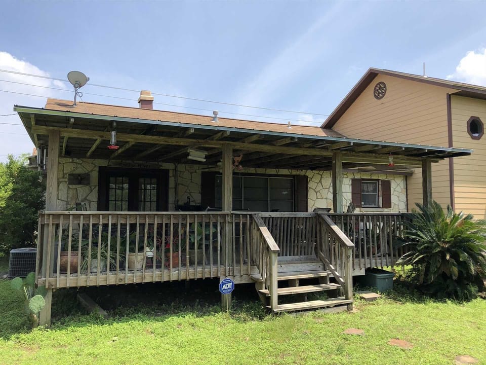 The back deck is nicely shaded, and even has a ceiling fan for stirring up a Hill Country breeze or two.