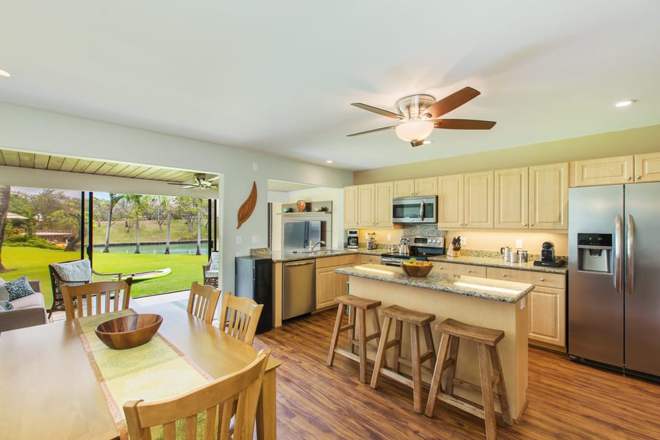 Fully equipped kitchen with all new appliances, and dining area.