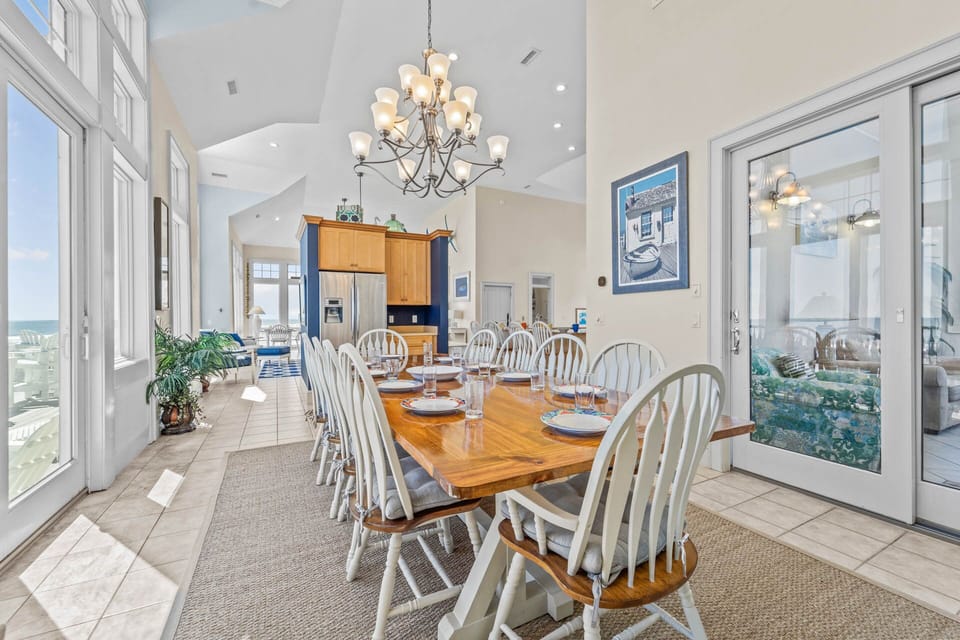 The dining room includes a second full-size refrigerator.