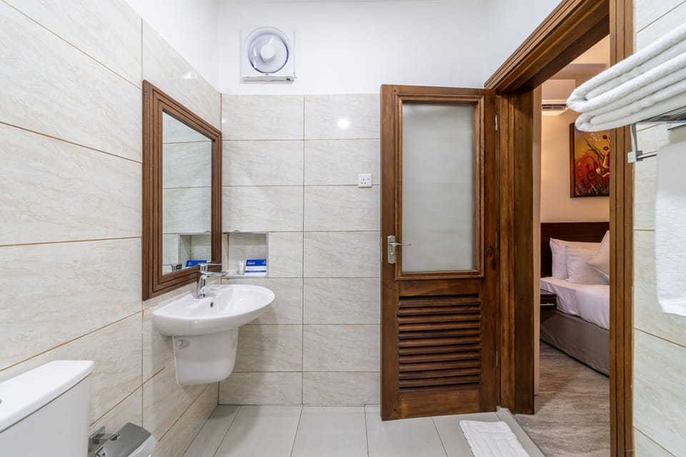 Shower, free toiletries, hair dryer, slippers