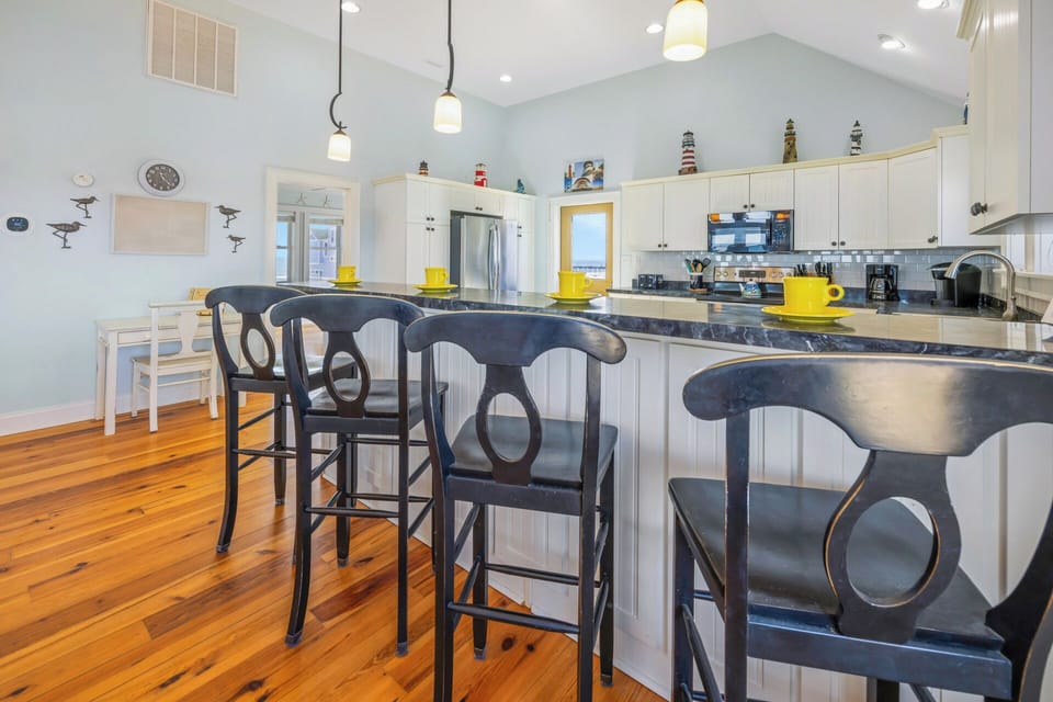 Pull a stool up to the breakfast bar to watch your favorite chef work their magic.