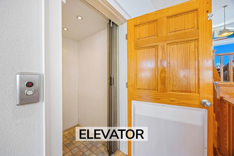 Surf or Sound Realty - 534 - Peaceful Retreat - Elevator - Label