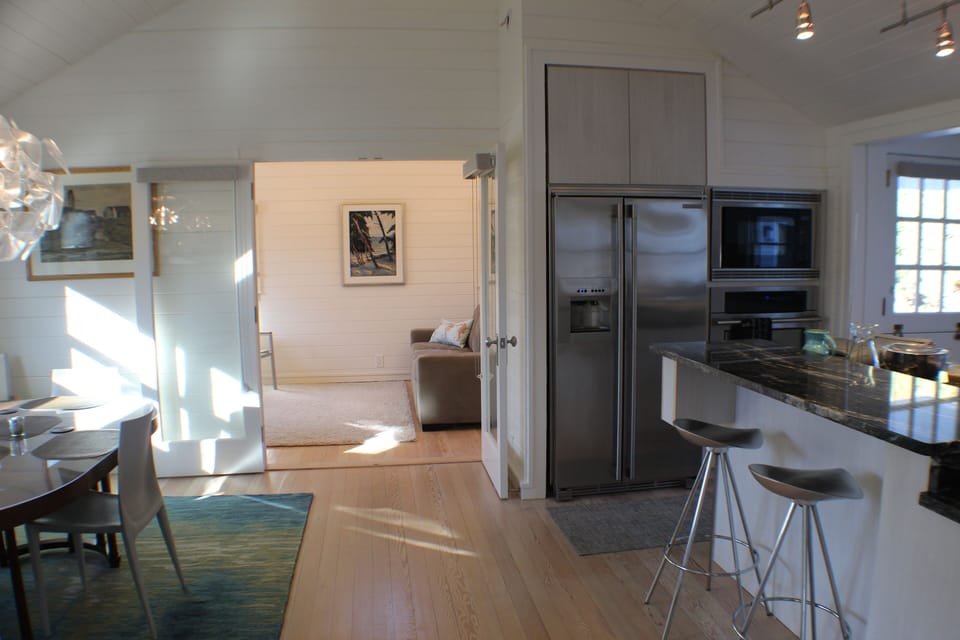 Looking toward family room/3rd bedroom with French doors with shades