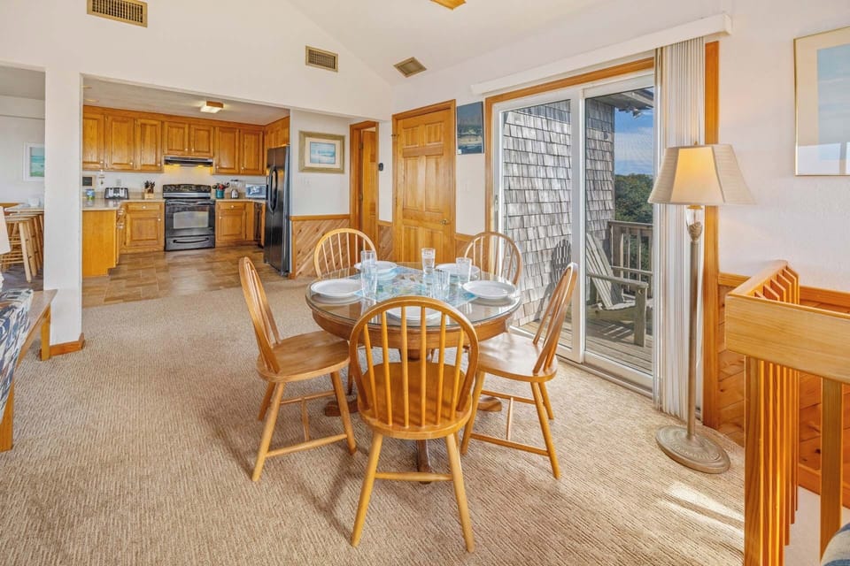 There's plenty of seating for the whole group - the main dining table seats 6, adjacent dining table seats 5, and breakfast counter seats 3.