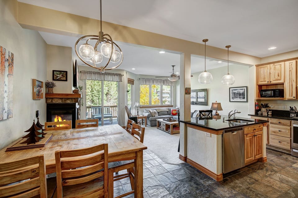 The inviting living space, showcasing a delightful chef's kitchen.