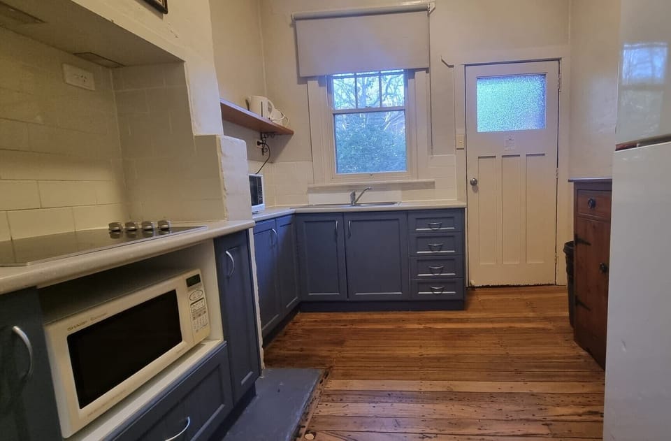 Family Cottage | Private kitchen | Microwave, electric kettle, toaster