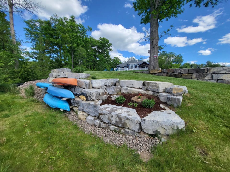New flower garden by the waterfront.  We added a fourth kayak. 