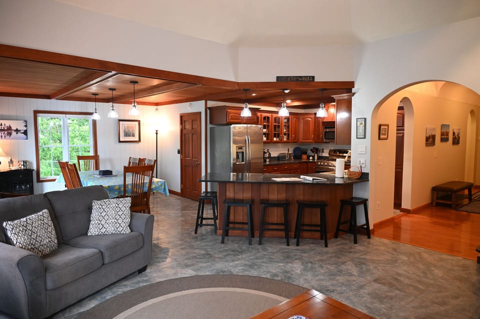 Open concept with living space, dining area, and kitchen.