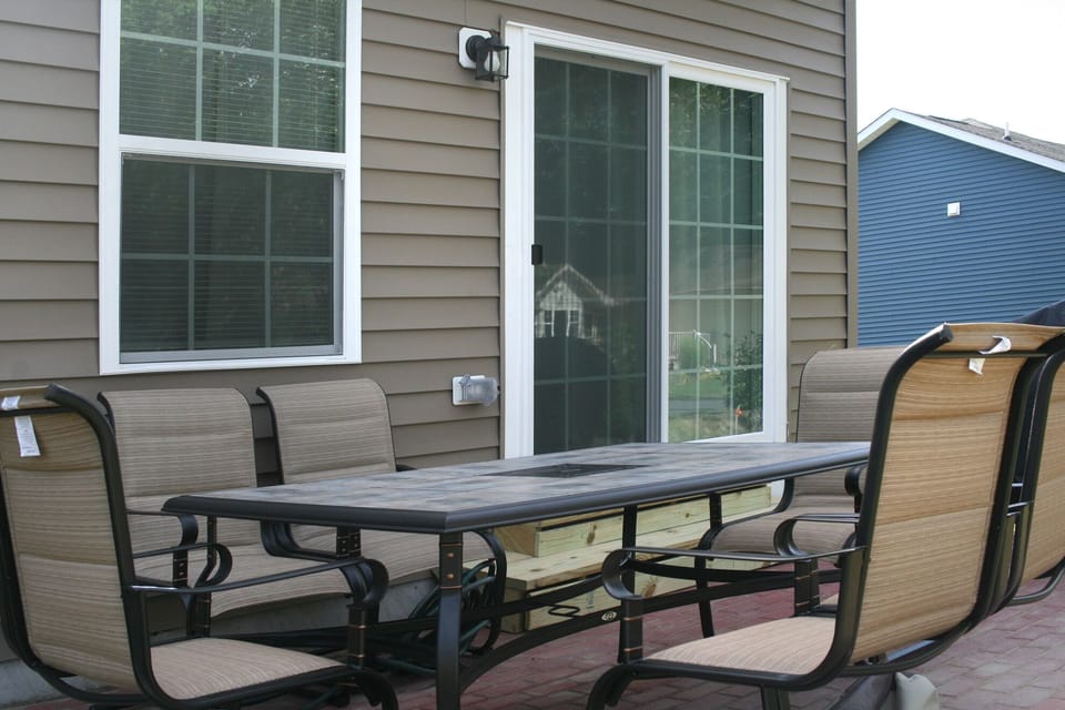 Patio sitting area with grill