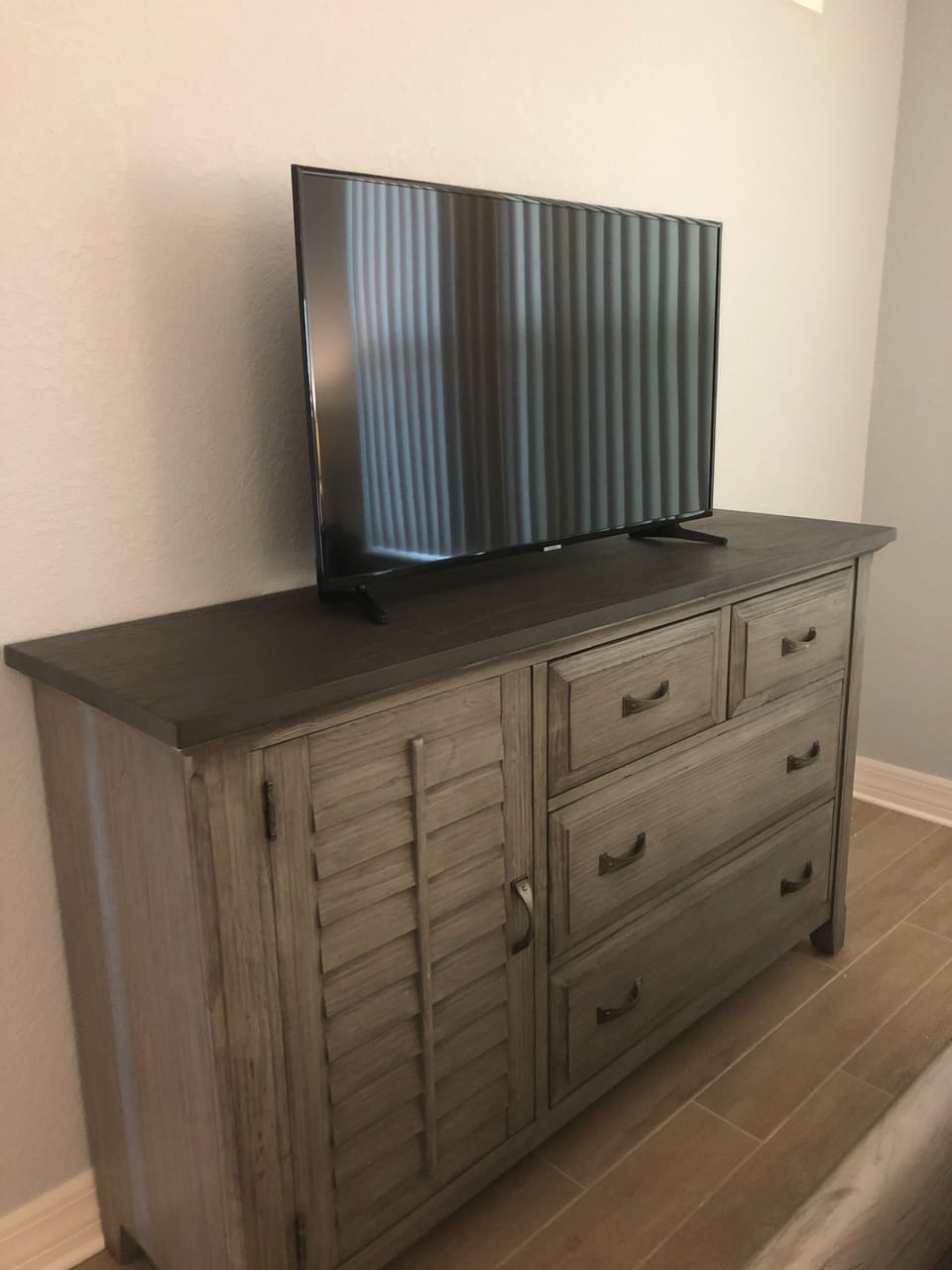 Flat screen smart TV in the master bedroom