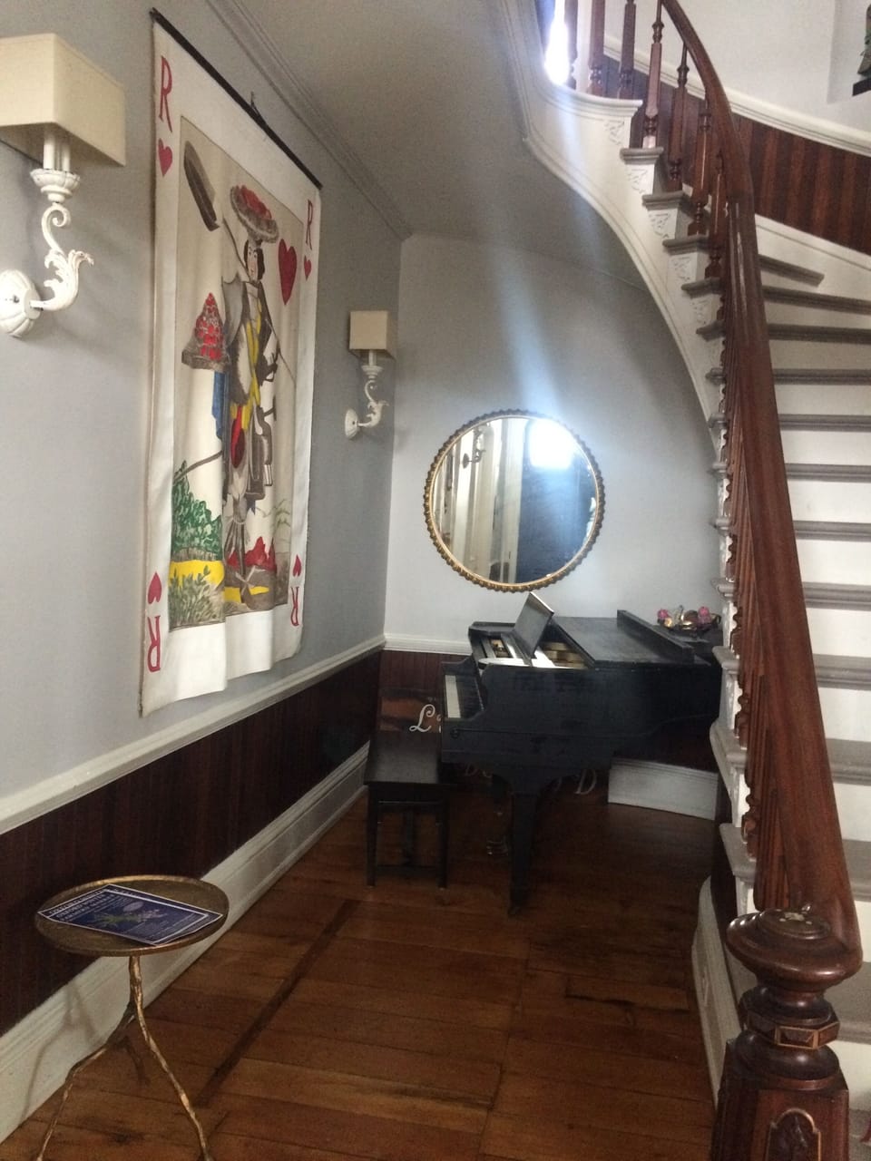 Foyer with grand piano for music lovers
