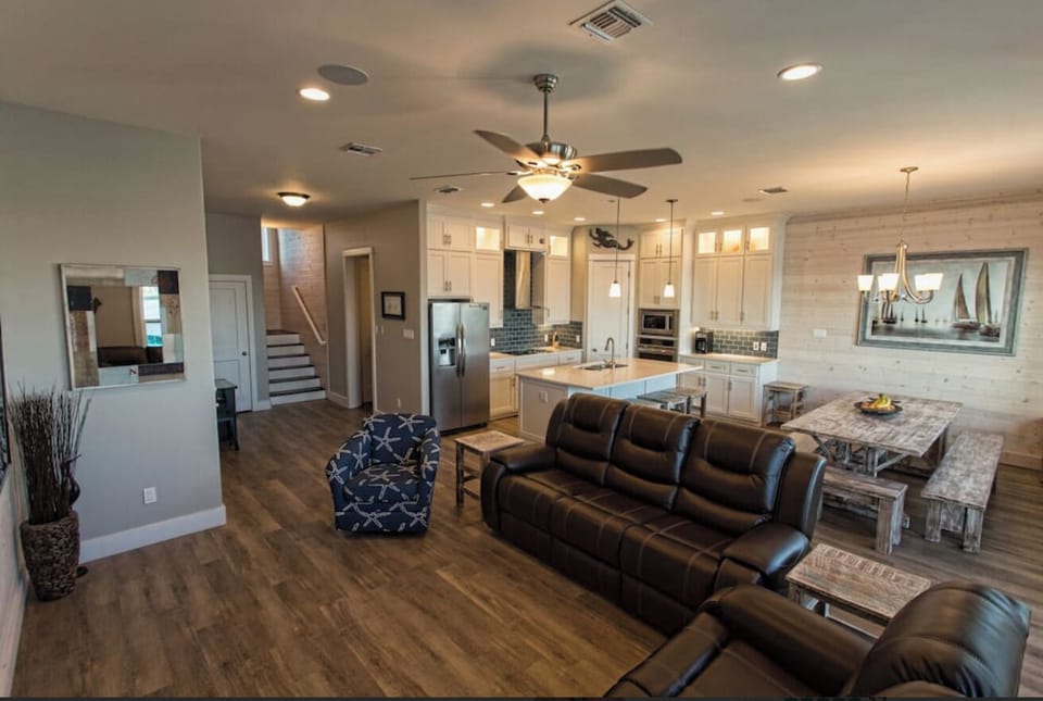 Living room, kitchen, and dining room.