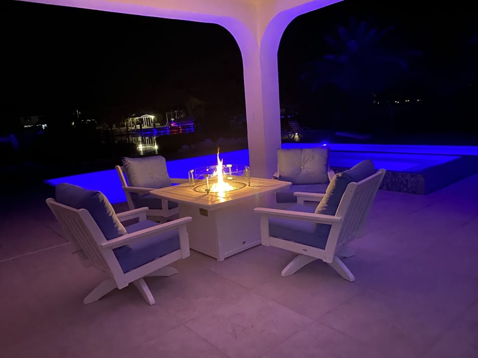 Polywood fire pit with comfy swivel
Chairs 