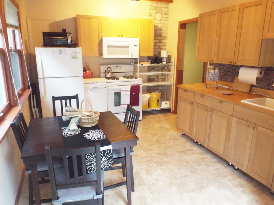 The kitchen gets lots of natural light from the south-facing glass door.