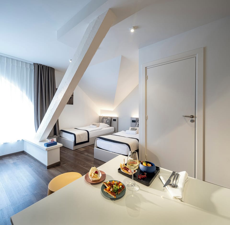 Family Quadruple Room | Hypo-allergenic bedding, in-room safe, individually furnished, desk