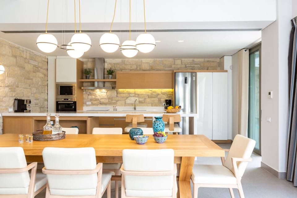 Guests enjoy eating while staying connected to the rest of the home