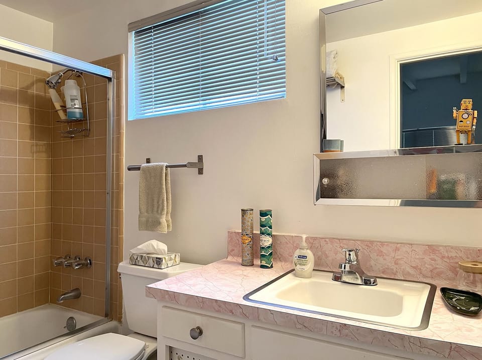 Bright and airy bathroom with vintage charm and natural light