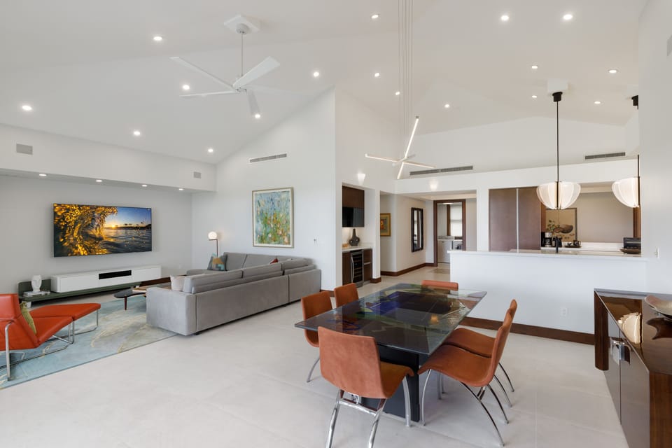 Gather around the glass dining table, comfortably seating six, for memorable meals together.