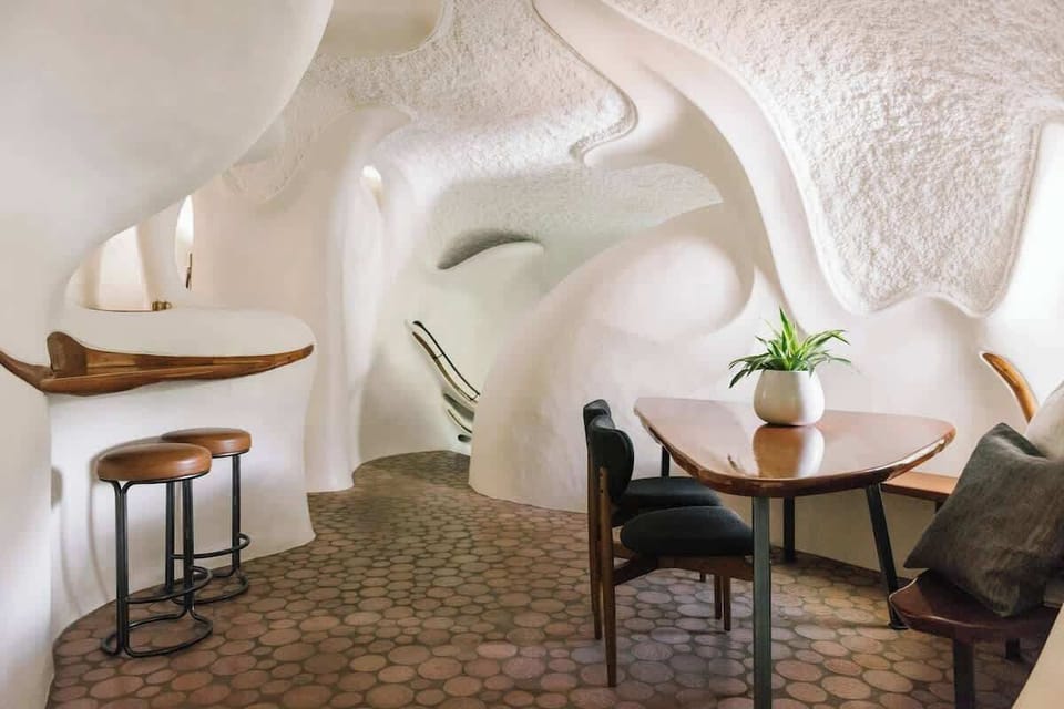 Intimate dining nook with sculptural design—perfect for slow mornings or cozy meals.