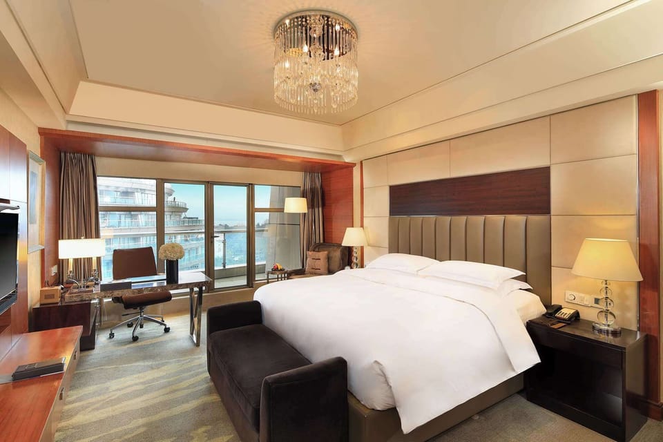 Premium bedding, down comforters, minibar, in-room safe