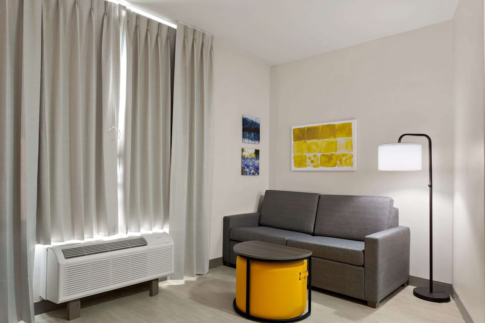 Suite, 1 King Bed with Sofa bed, Accessible, Non Smoking | Desk, iron/ironing board, cribs (free), WiFi (free)