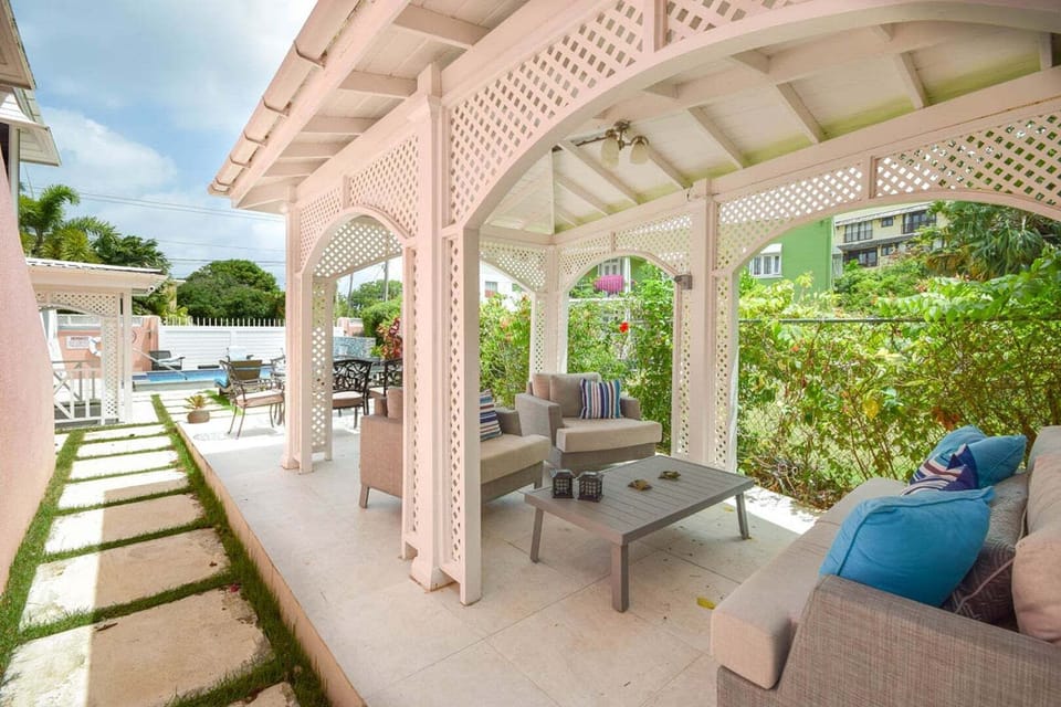 Covered gazebo with comfortable couches