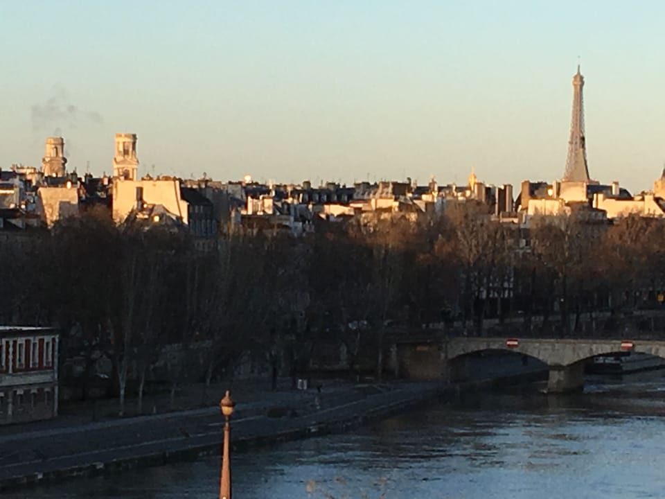 overlooking Paris most famous monuments: Eiffel Tower...