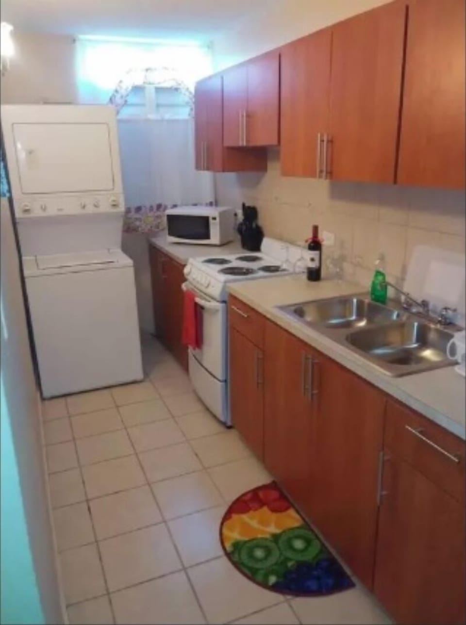 Kitchen with washer and dryer