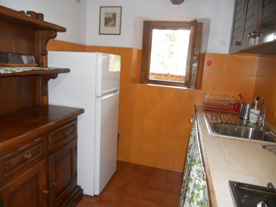 Our good equipped kitchen with porcelain dishes, cups and all kind of cookwares