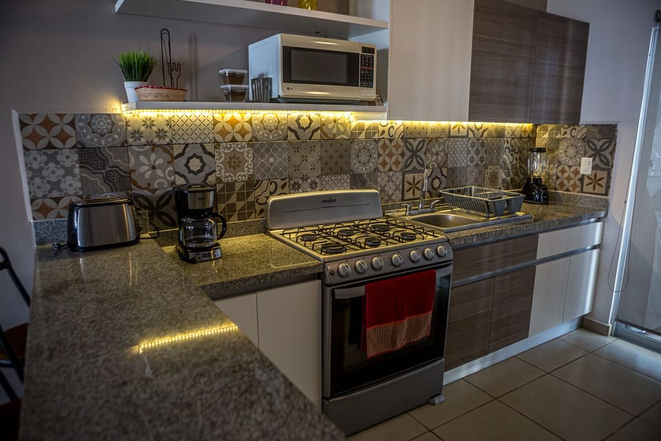 Modern gourmet kitchen with full appliances