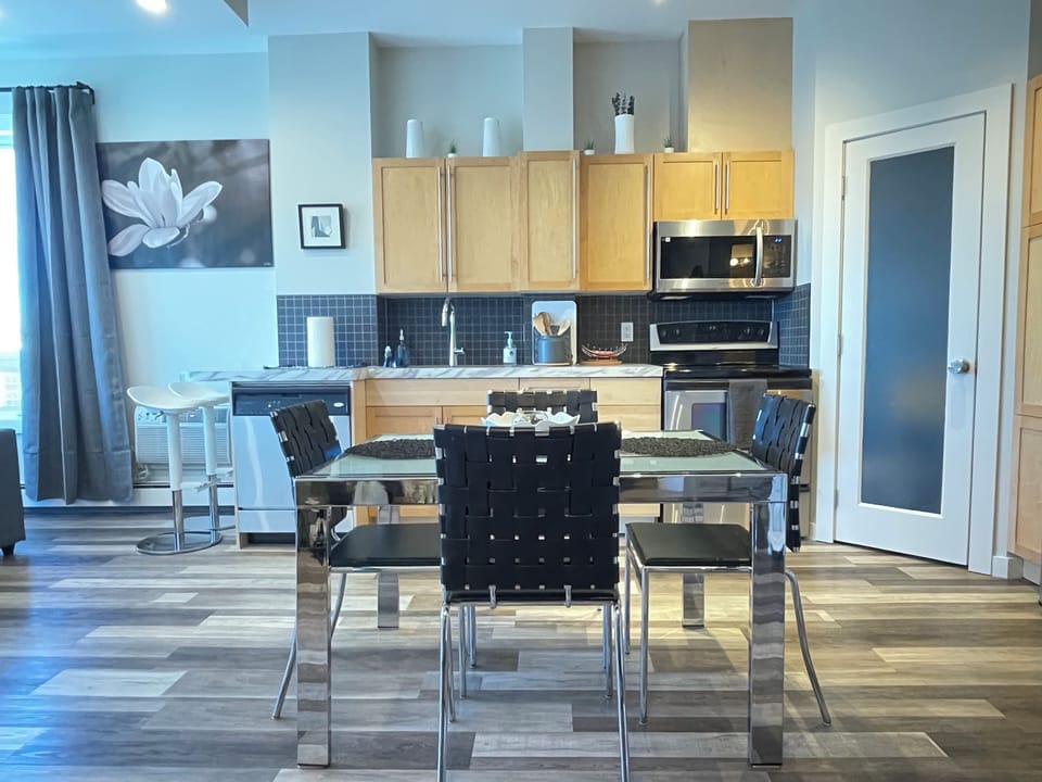 900 sq ft open living space kitchen has beautiful city skyline views. 