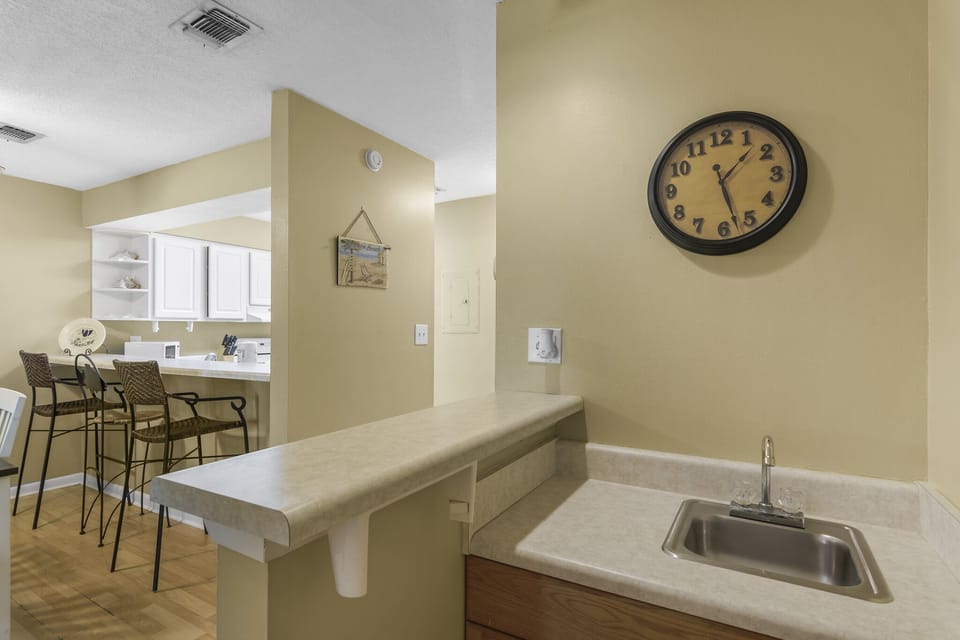 A handy pass-through bar connects the kitchen and dining area.