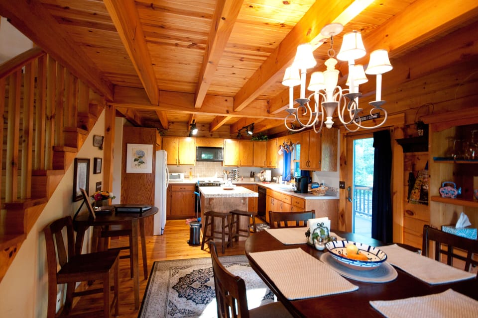 Dining area open to the kitchen to keep it social even while preparing meals