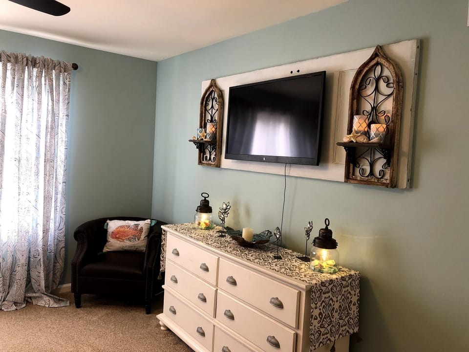 Master bedroom - king bed, dresser, TV nightstands, chair & private master bath