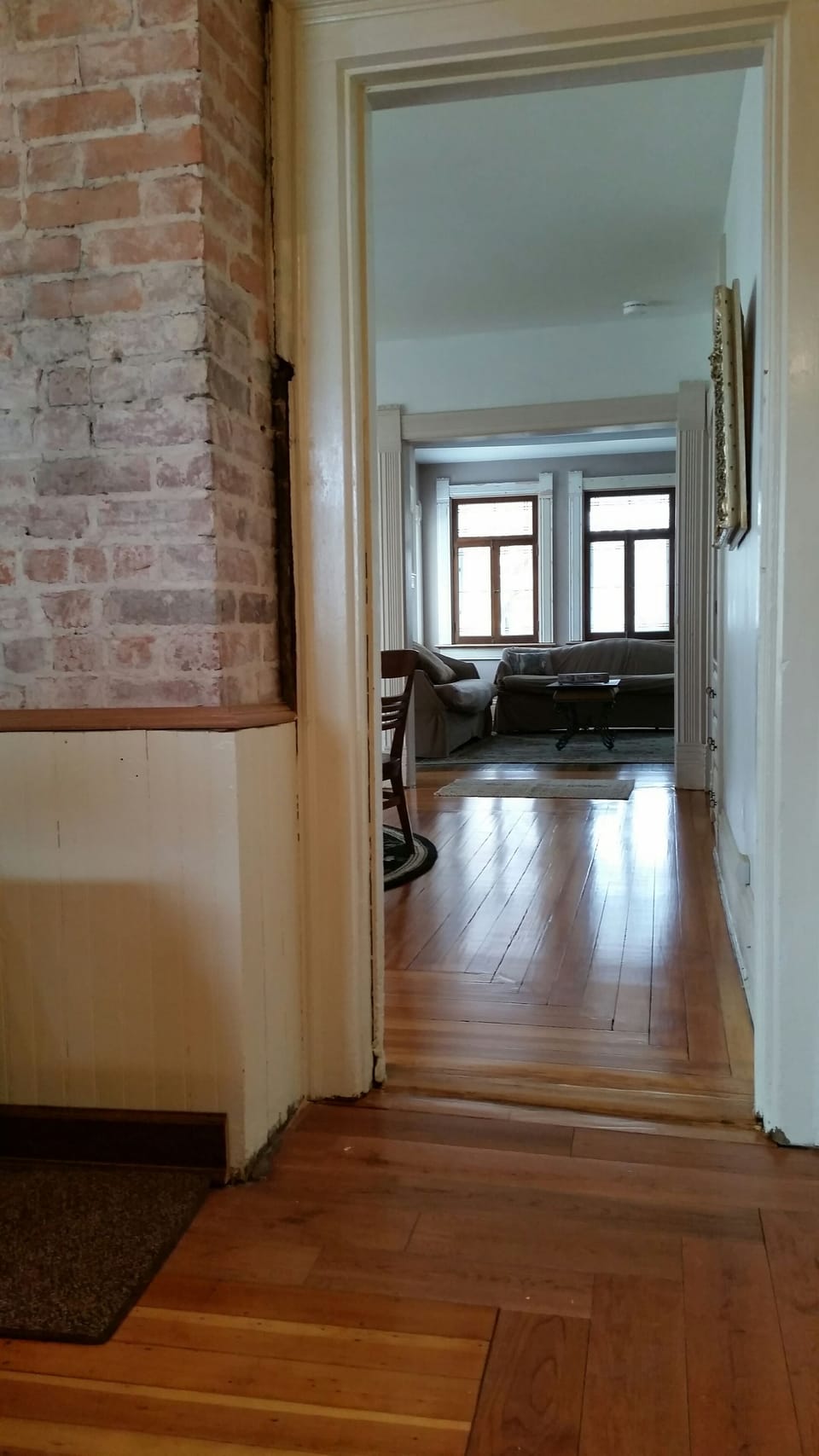 View from kitchen through dining room to the family room. 