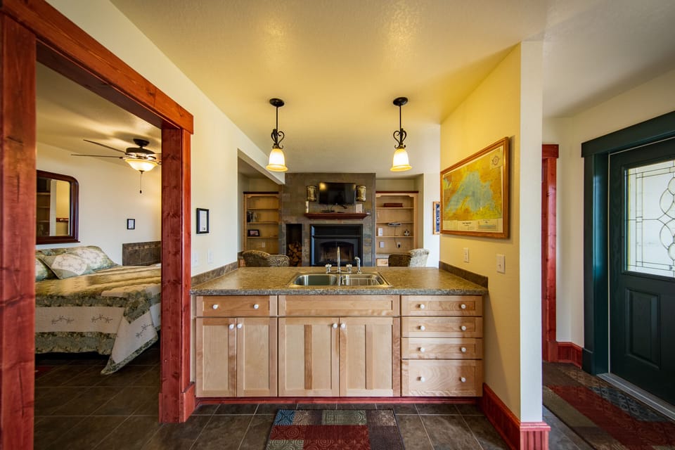 View from Kitchen
The open floor plan for Inn Suite #7 integrates the kitchen , dining area, living area, and bedroom area into an open but intimate space. It is ideal for a refreshing getaway on the North Shore.
