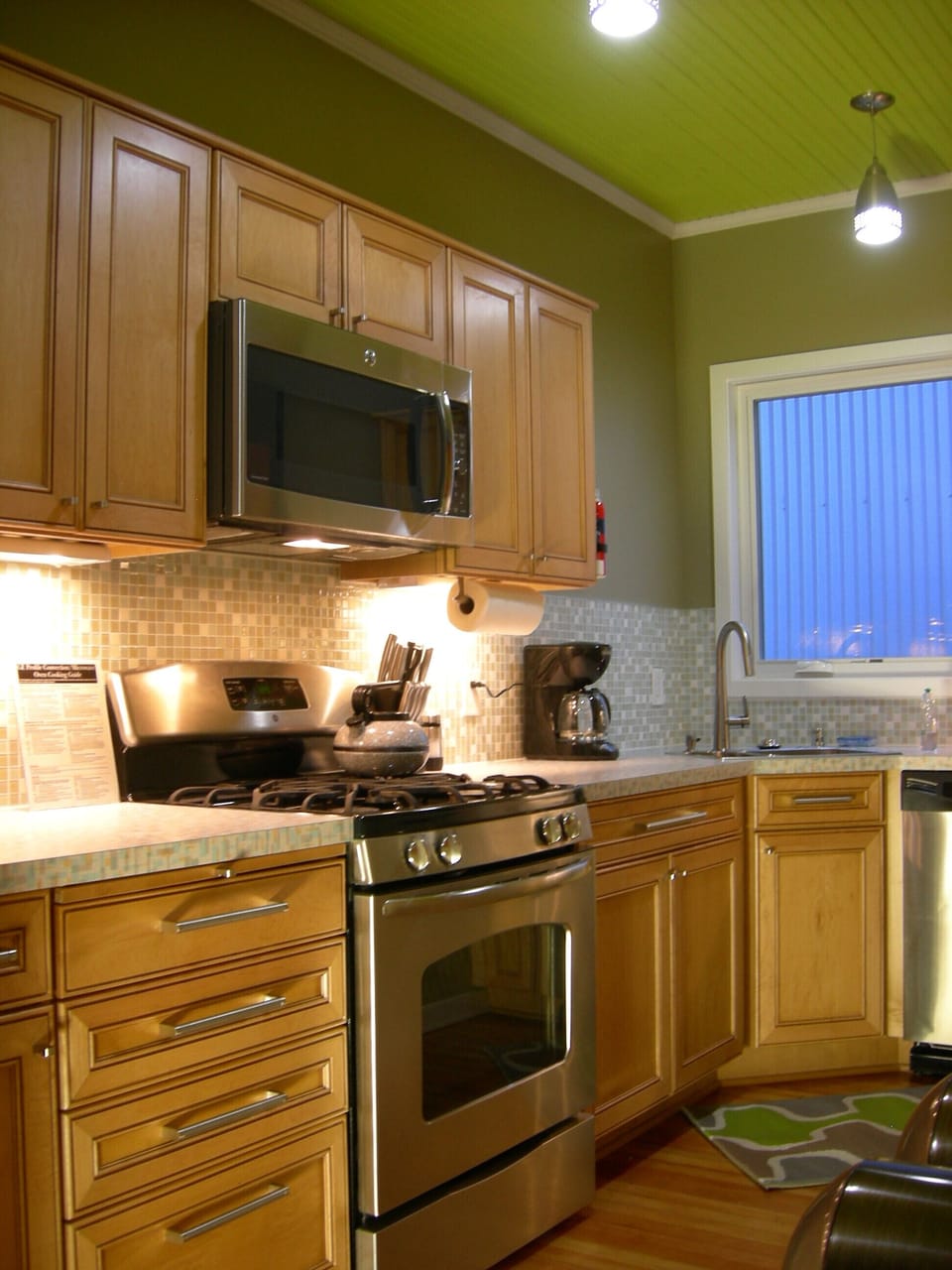 Fully equipped Chefs kitchen with retro glass tile backsplash.