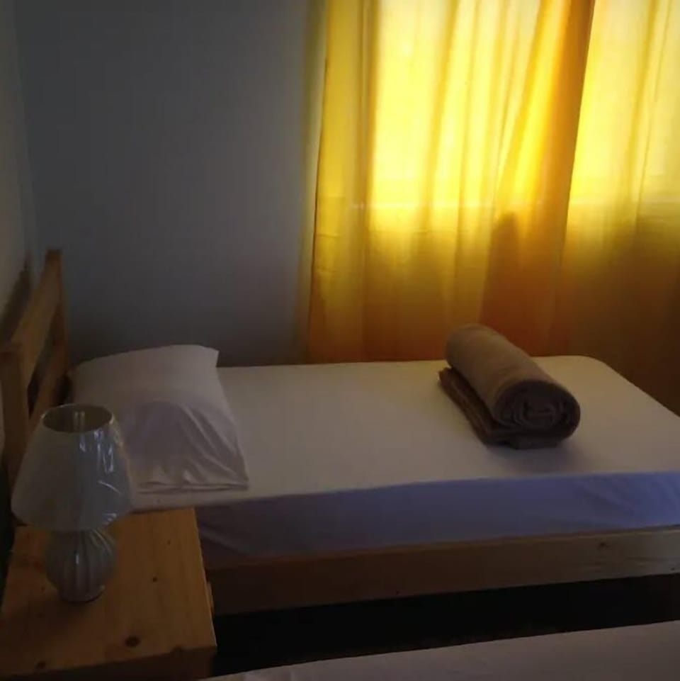 Desk, blackout drapes, rollaway beds, bed sheets