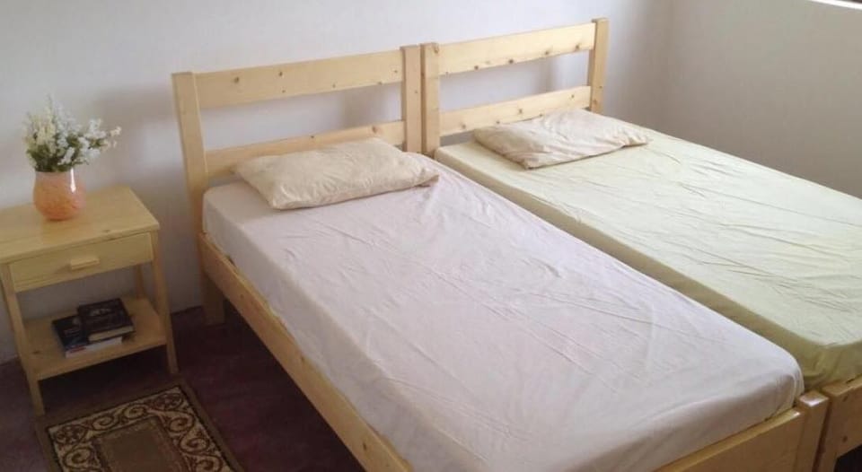 Desk, blackout drapes, rollaway beds, bed sheets
