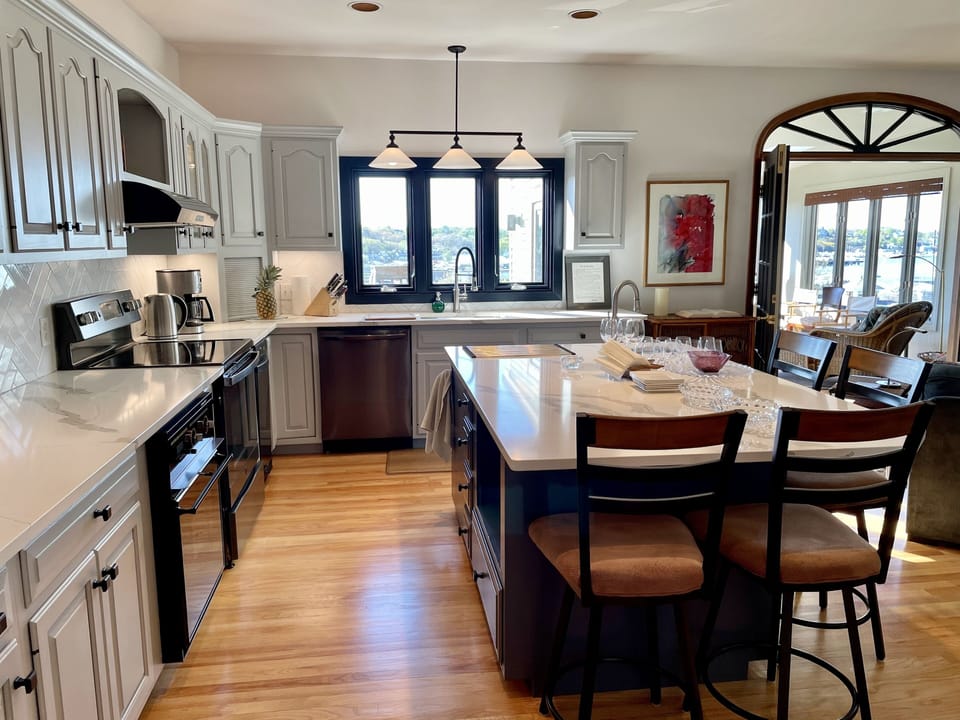Kitchen adjacent to Family Room and Sunroom