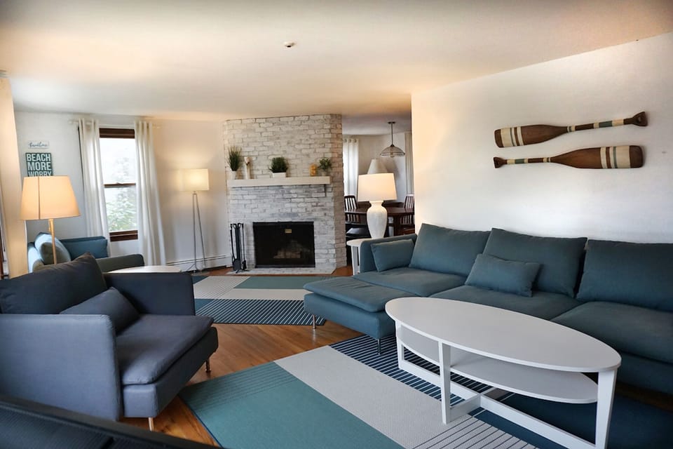 Large living room with TV and fireplace